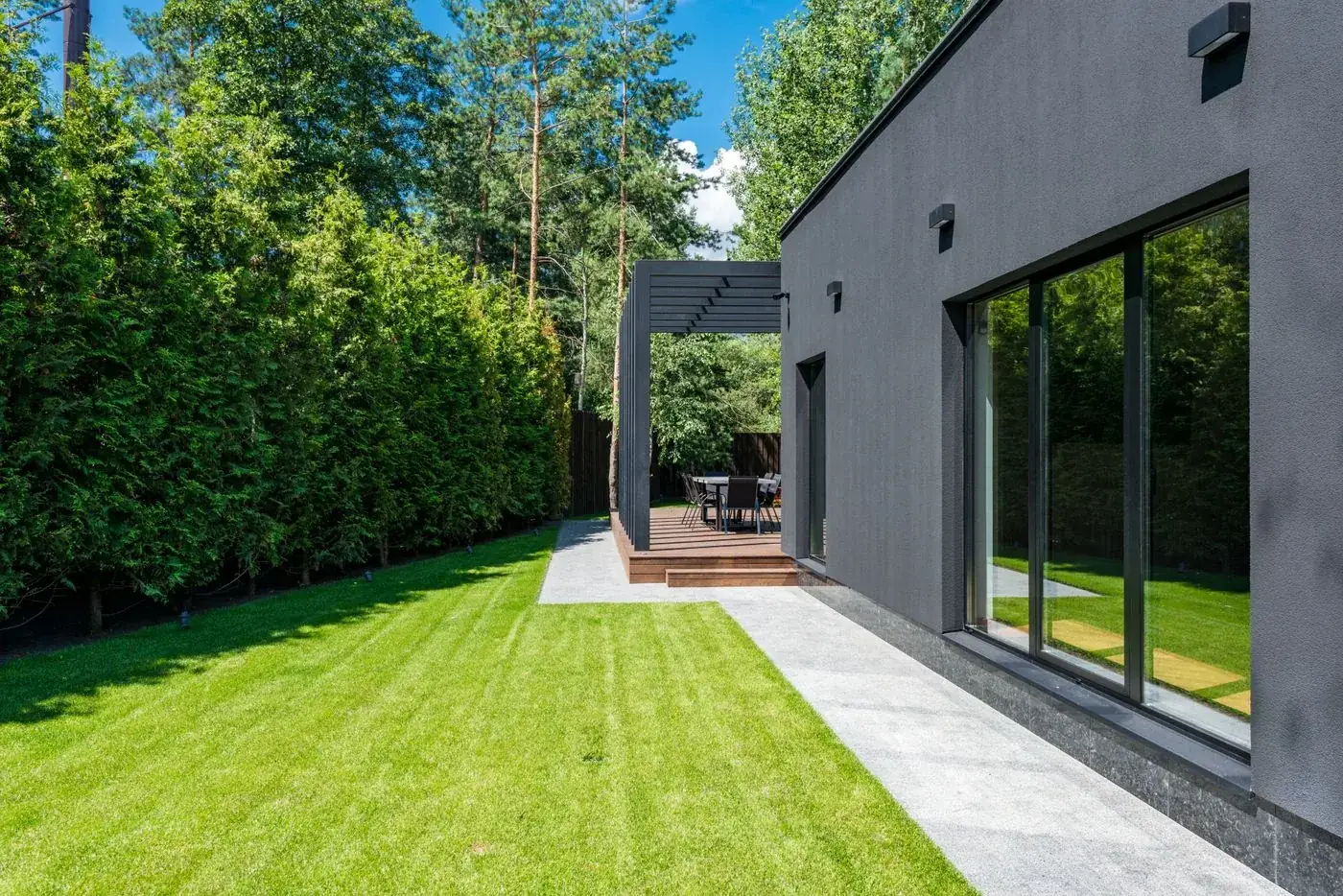 A modern home exterior at dusk